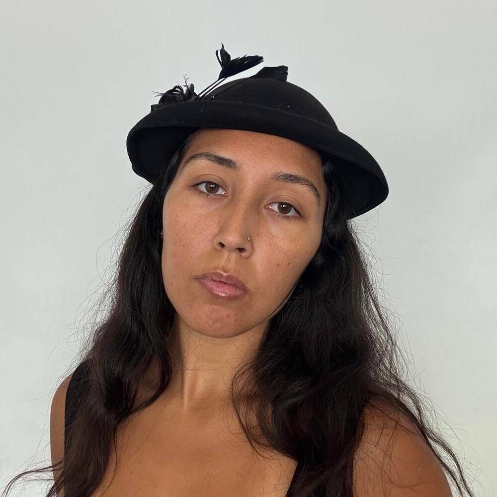Vintage 1940s/50s womens wool hat with feathers